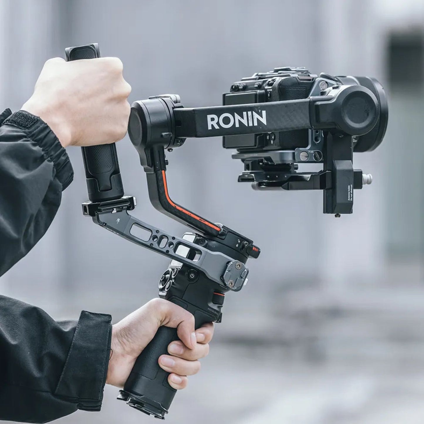 Desktop tripod with camera mounted, three legs extended from the center base