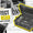Open black protective hard case holding a multimeter and hand tools in cut foam, headline Protect Any Gear