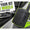 Wheeled black hard case with extended handle rolling past a railway platform, label reading When Your Kit Needs Wheels