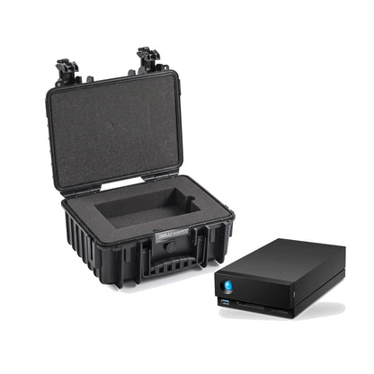 Black hard protective case with open lid and laser-cut foam insert for storage