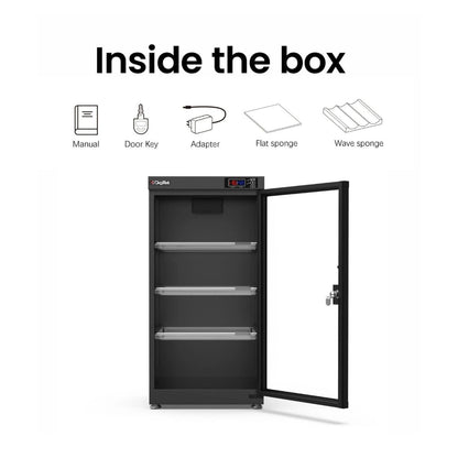 Open 105-liter dry cabinet with door key, manual, adapter, and cleaning sponges.