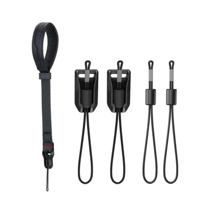 Black wrist strap kit with magnetic buckle, cords, and two accessory clips