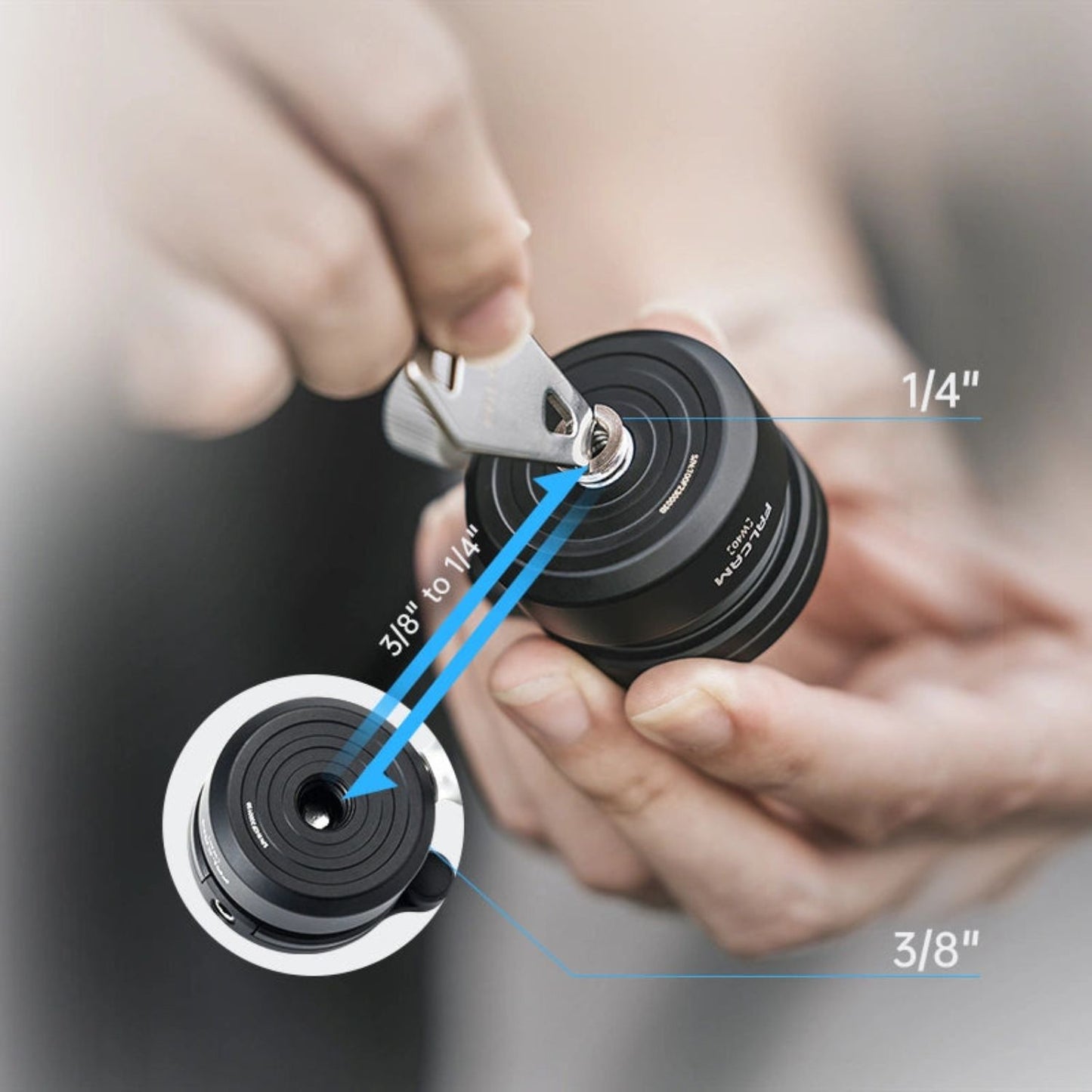 Black ball head with top plate and screw interface, showing compact form factor