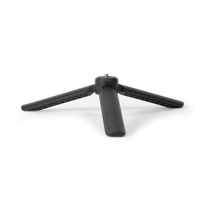Black desktop tripod with three spread legs and quick-open center column