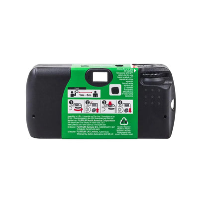 Back view of black disposable camera with green label and photo instructions panel