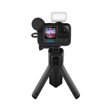 GoPro HERO 12 camera rig on tripod with black housing and white light