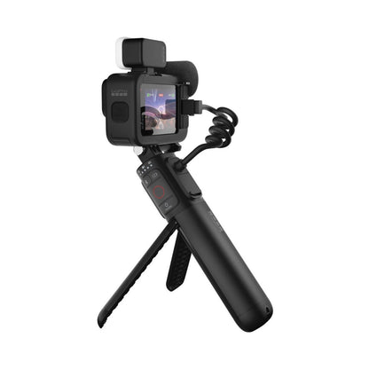 GoPro HERO 12 camera rig on small tripod with mic, black housing and white light