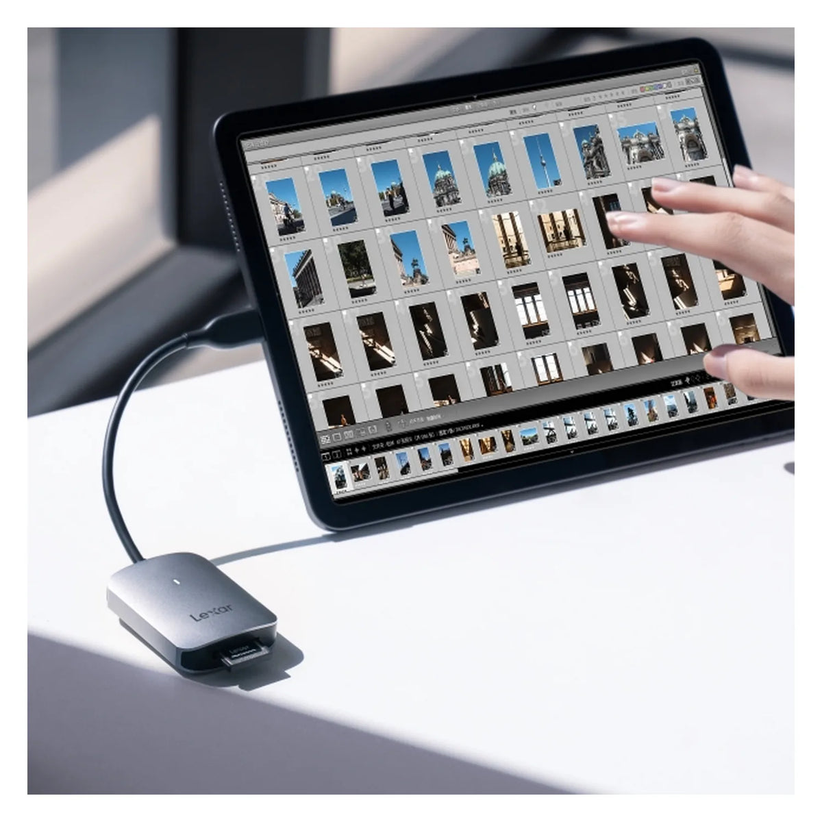 Lexar CFexpress Type A USB-C reader connected to device, light gray housing.