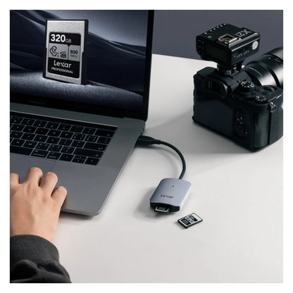 Lexar CFexpress Type A USB-C card reader with memory card inserted, light gray body.