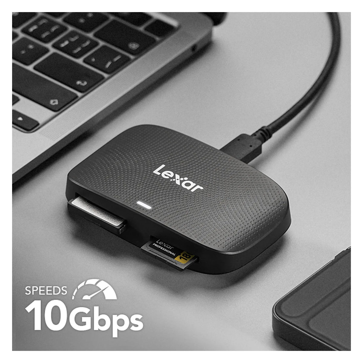 CFexpress Type B and SD card reader on laptop; 10Gbps shown, ports face outward