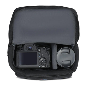 Mobius DSLR sling bag open, padded interior holding a camera and lens