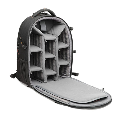 Black camera backpack opened to show padded foam compartments for gear