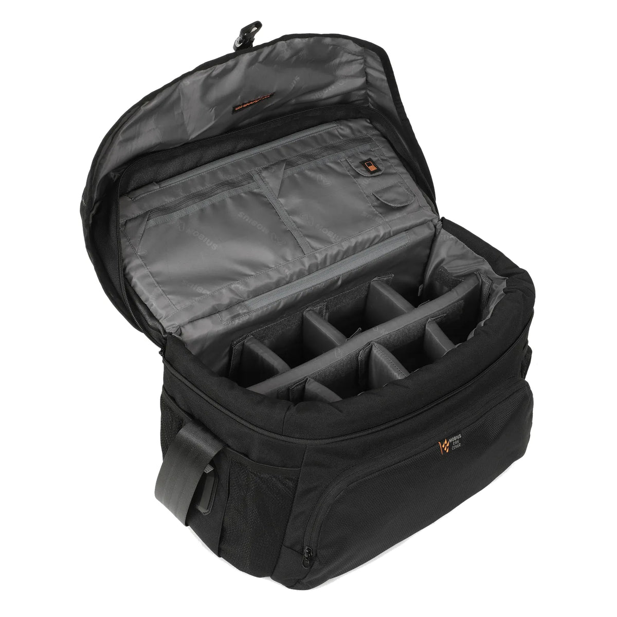 Black DSLR sling bag open to padded camera compartments with rain cover inside