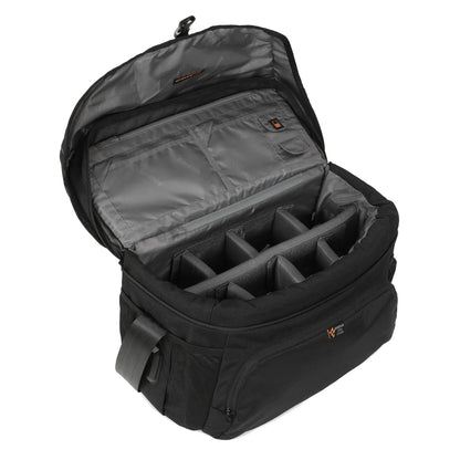 Black DSLR sling bag open to padded camera compartments with rain cover inside