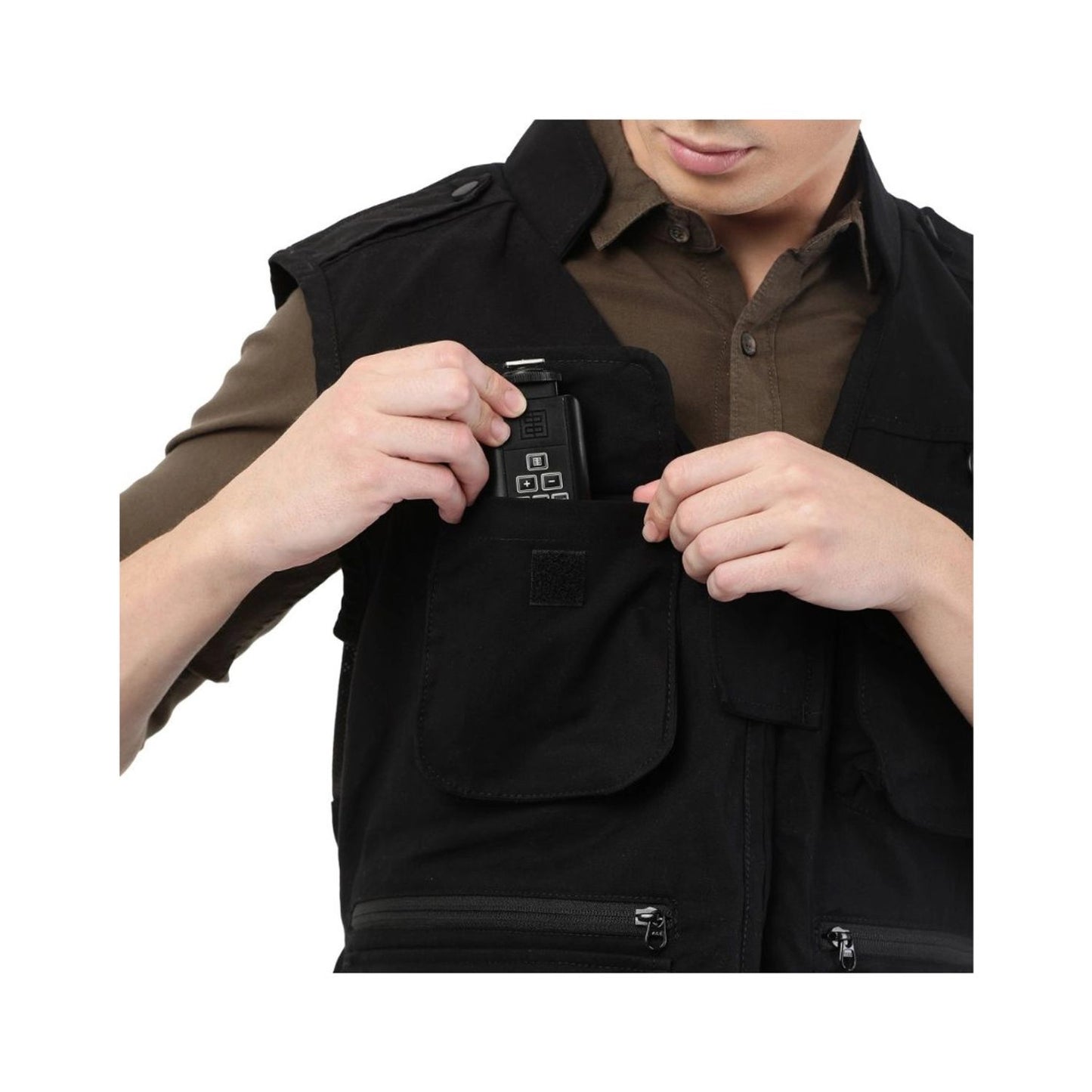 Black jacket chest pocket with small device module, snap tab and zips