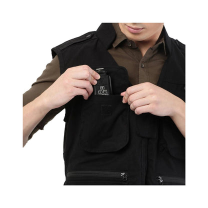 Black jacket chest pocket with small device module, snap tab and zips