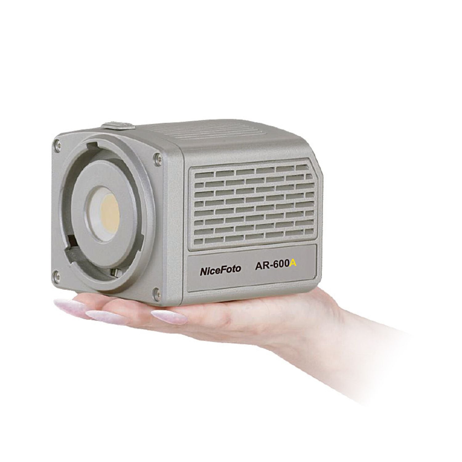 Portable LED video light in light gray housing, held in one hand