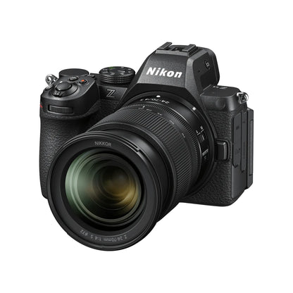 Black mirrorless camera with lens, side controls and Nikon badge visible