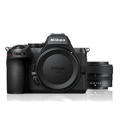 Black mirrorless camera with lens mounted, front lens cap on