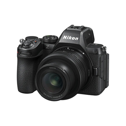 Black mirrorless camera with front zoom lens, three-quarter angle