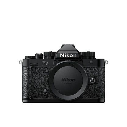 Black Nikon Zf mirrorless camera with lens, top-front view