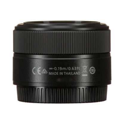 NIKKOR 28mm f/2.8 lens back, textured rings and certification markings