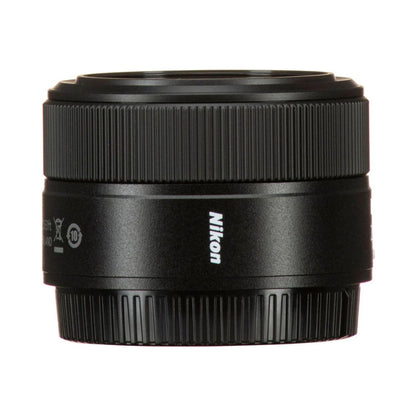 Nikon Z 28mm f/2.8 lens side, “Nikon” branding and ribbed grip