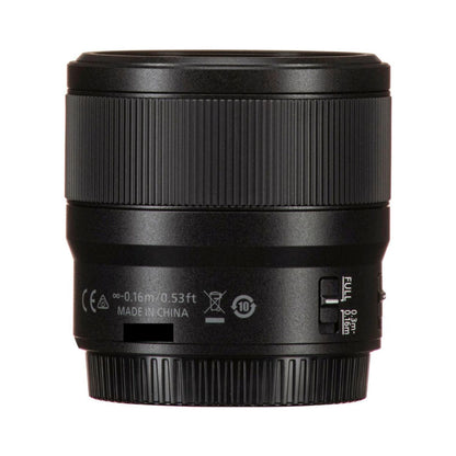 NIKKOR MC 50/2.8 macro lens rear view with distance and compliance markings
