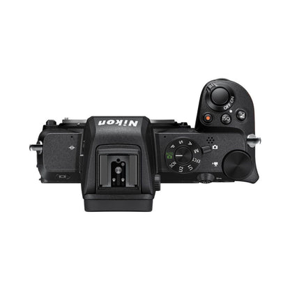 Mirrorless camera top view with mode dial, ISO and hot-shoe