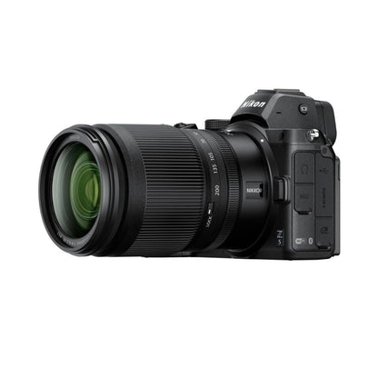 Nikon Z5 mirrorless camera with 24-200mm lens, side view showing grip and lens details