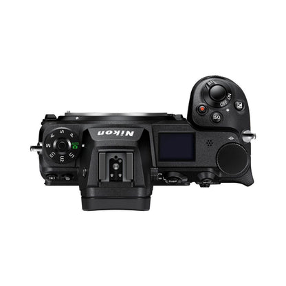 Mirrorless camera top view with mode dial, ISO button, and control wheel
