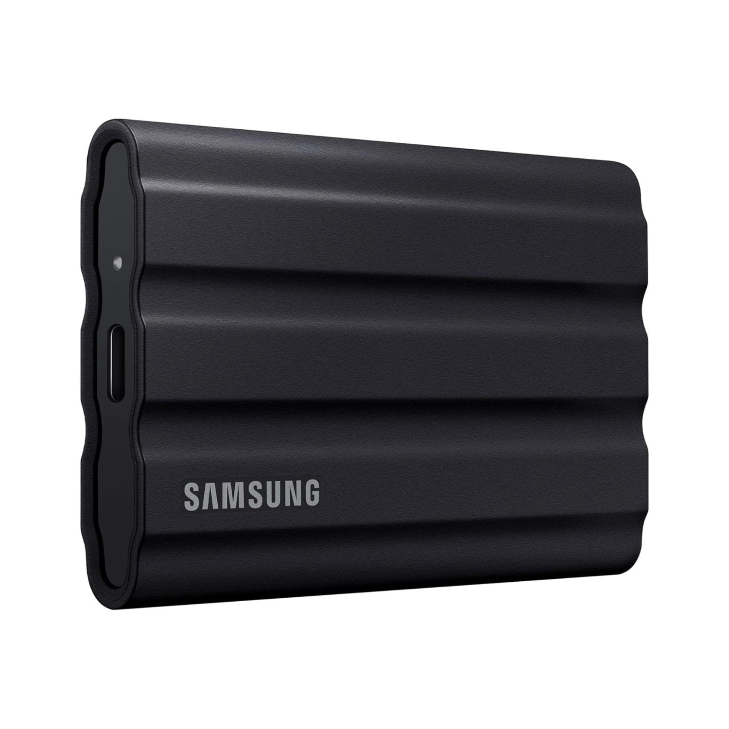 Samsung T7 Shield SSD externo portátil de 2TB, carcasa negra con logo y borde protector.