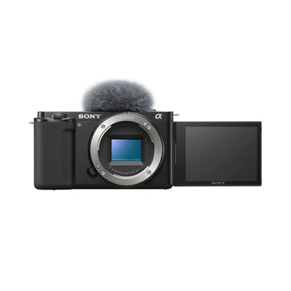 Mirrorless camera with flip-out display and furry windscreen mic