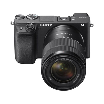 Sony a6400 mirrorless camera with 18-135mm lens, angled front view