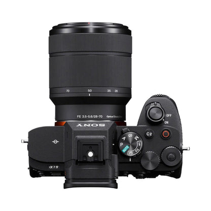 28-70mm lens with camera top controls, black mirrorless body