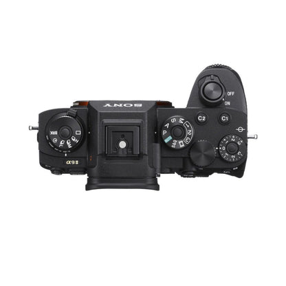 Top view of Sony α9 II mirrorless camera with mode dial and control wheels