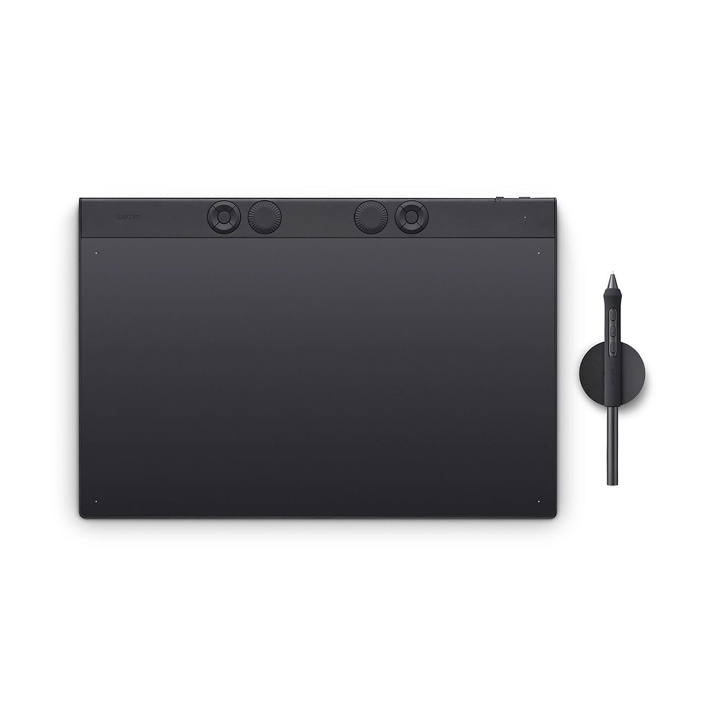 Black Intuos Pro Large tablet top view with four control dials and included pen