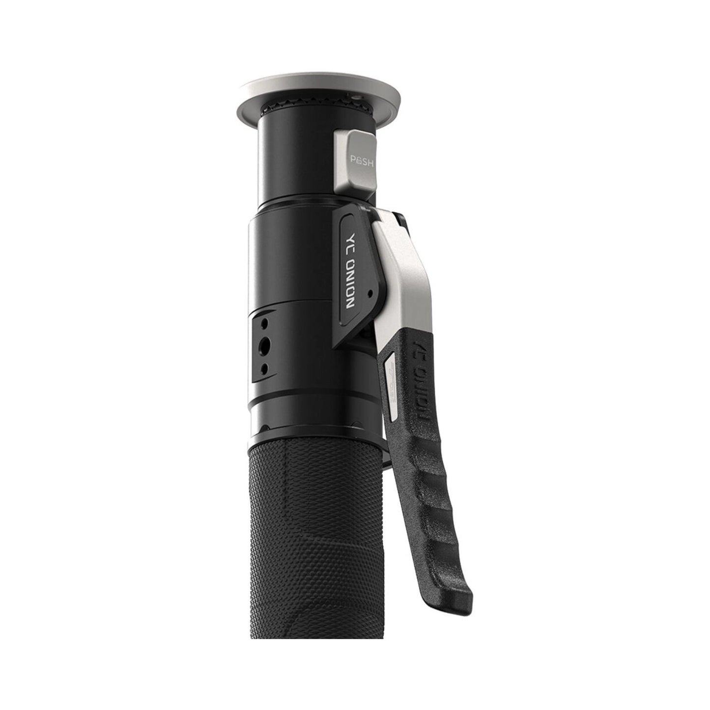 Fluid head close-up with textured grip and side control switches