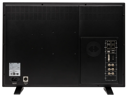 Flanders Scientific DM242 monitor rear panel with ports, ventilation, and stand feet